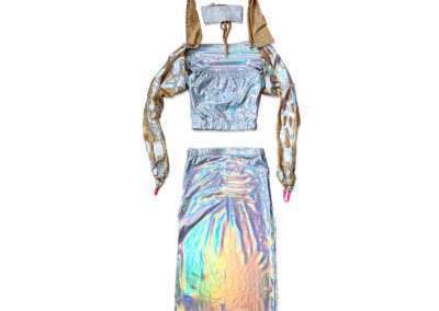 A costume skirt and top made of shiny, iridescent fabric