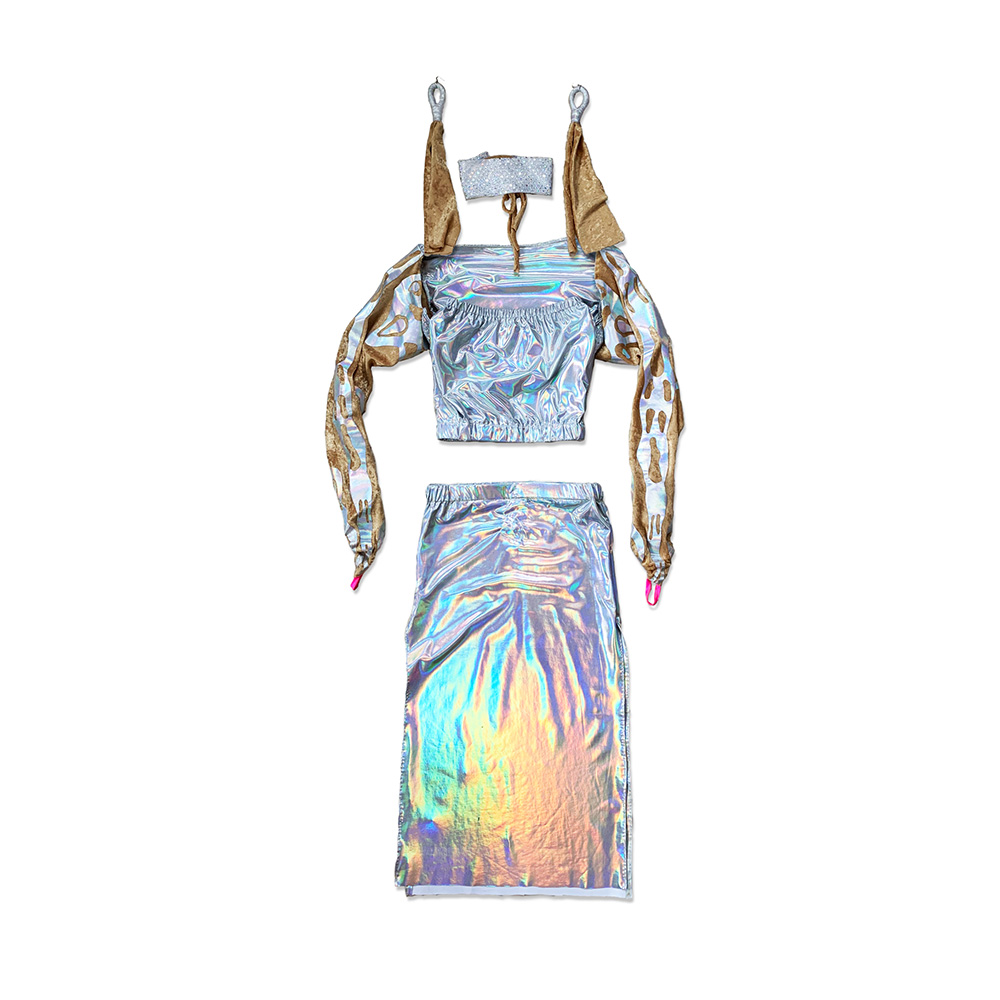 A costume skirt and top made of shiny, iridescent fabric